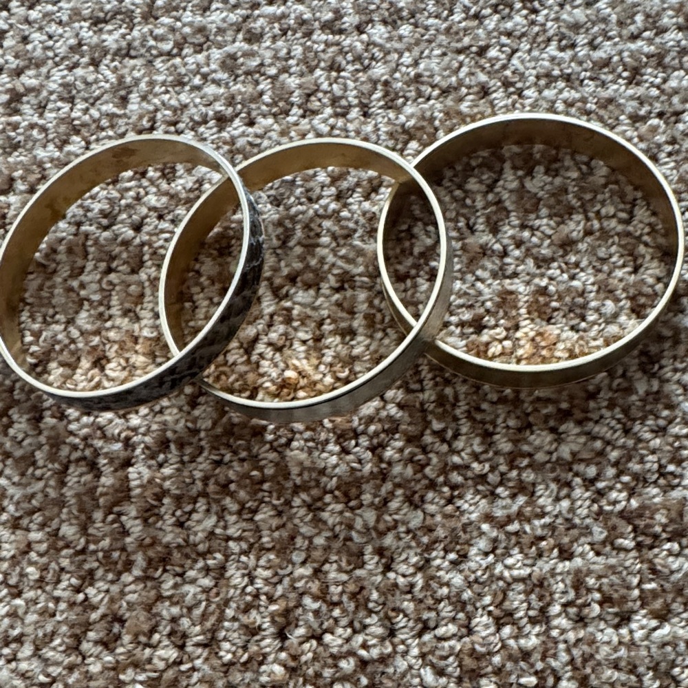 Set of Three Gold and Black Bangles